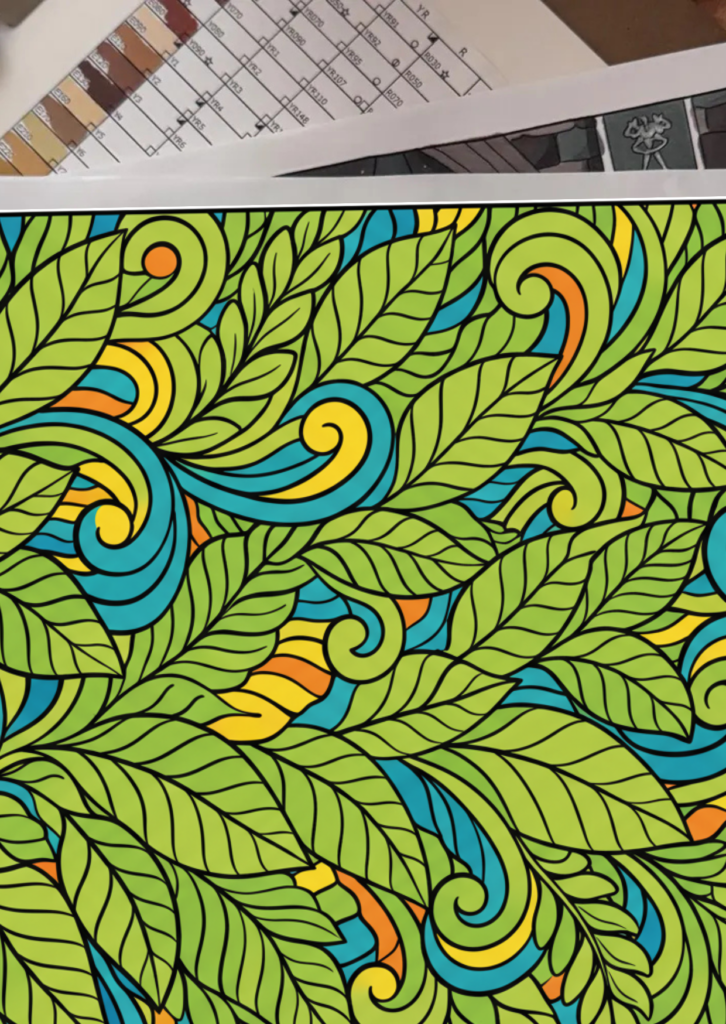 Completed colored adult coloring sheet with bold outlines, used by teachers and parents.